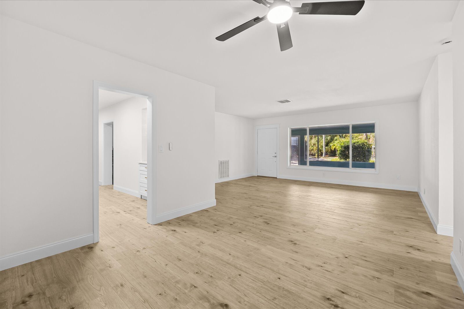 Dining and sunroom after renovation